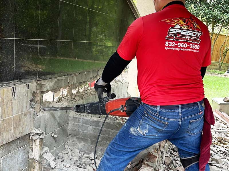 loading furniture and junk into a trailer, residential junk removal, houston tx, speedy junk removal