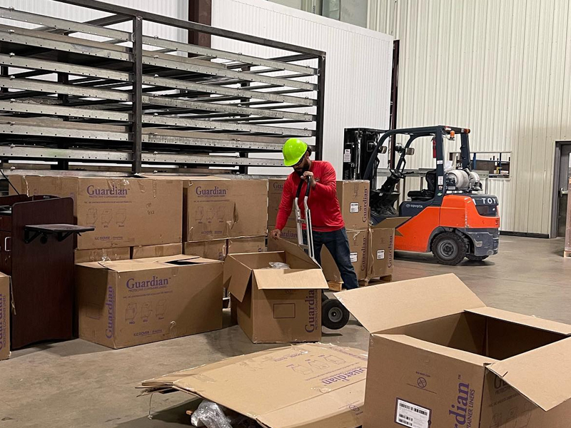 Speedy junk removal team in front of full trailer, commercial junk removal, houston tx, speedy junk removal